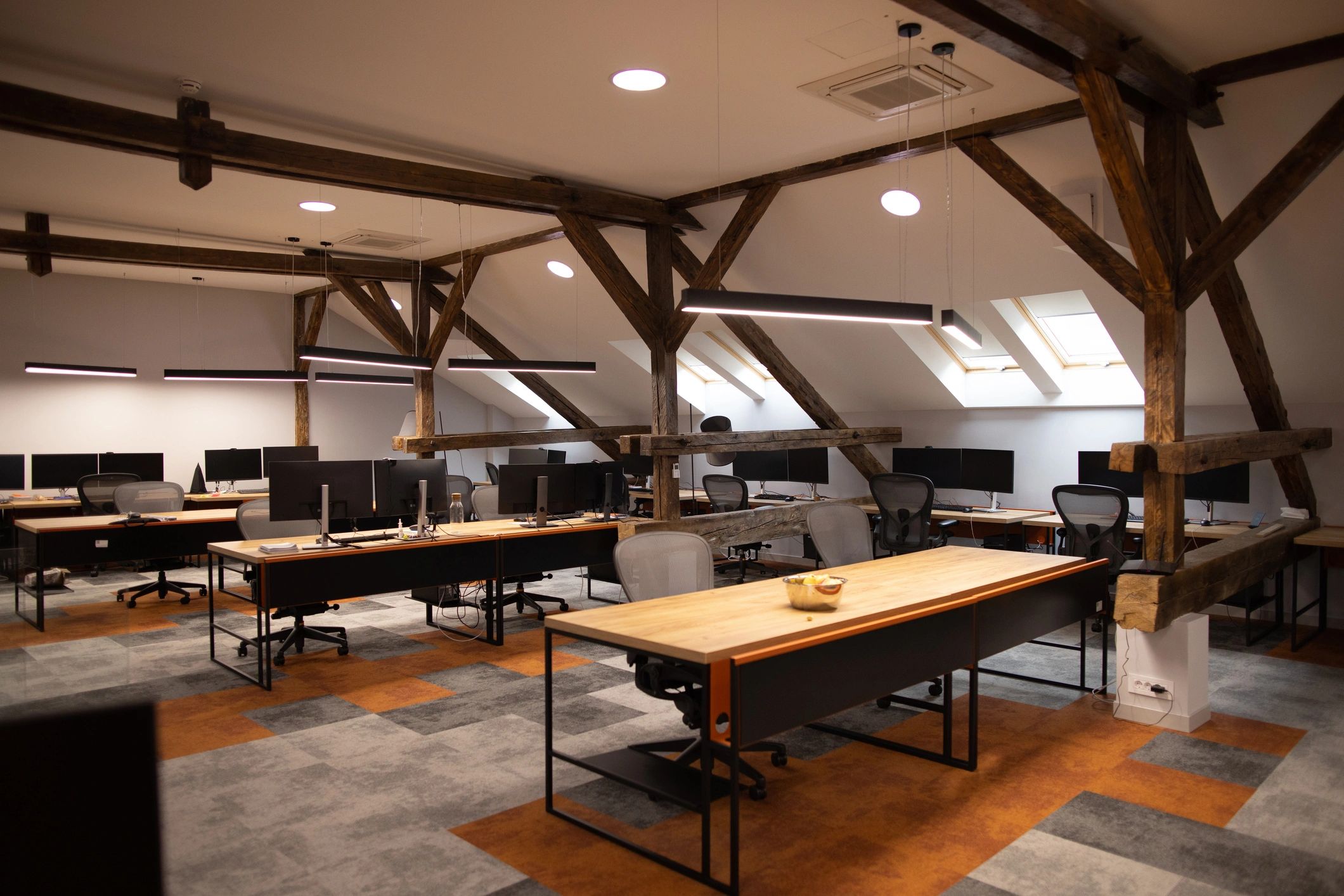 Executive office workspace with computers and clean modern design