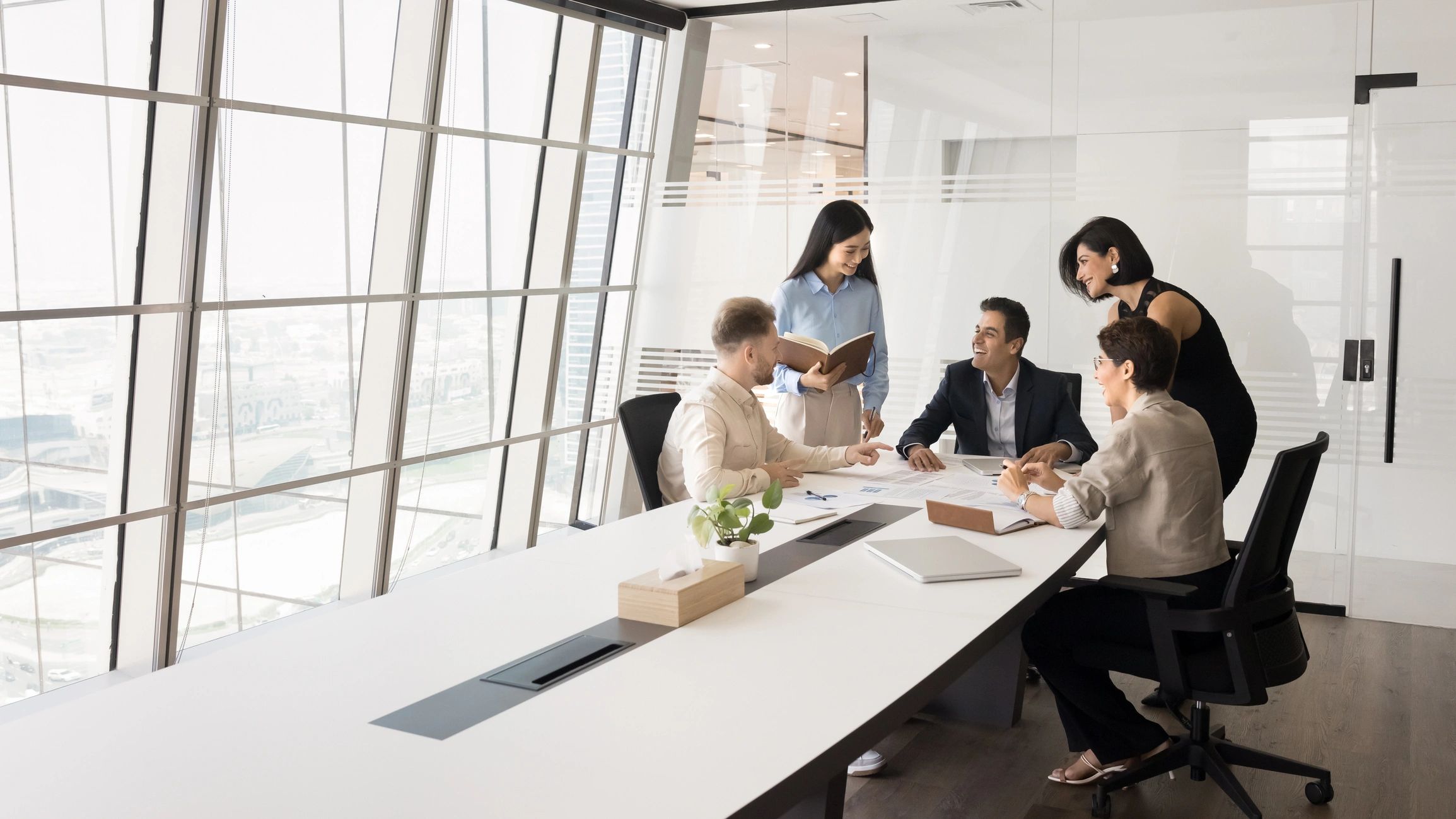 Professional advisory team in a boardroom discussion